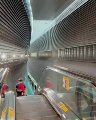 Image 8: We recently revisited one of our older projects: Stadium MRT Station in Singapore. It was designed in 2000 (25 years ago!), the start of construction was a year later and it was completed in 2008. The station can be naturally ventilated (the day we visited there really was no air conditioning running, which made us very happy) and uses daylight, even in the underground levels - this saves a lot of energy and brings the outdoors inside. The skylights and louvered walls enable a direct connection to the outside and create a calm, easily navigable environment in a station that has to handle high traffic and surge crowds (during events at the National Stadium). #stadiummrt #publictransport #singaporemrt #kallang #stadium #nationalstadiumsingapore #singapore #architecture #design #naturalventilation #daylight #passivedesign #sustainabledesign #sustainability #woha #wohaarchitects